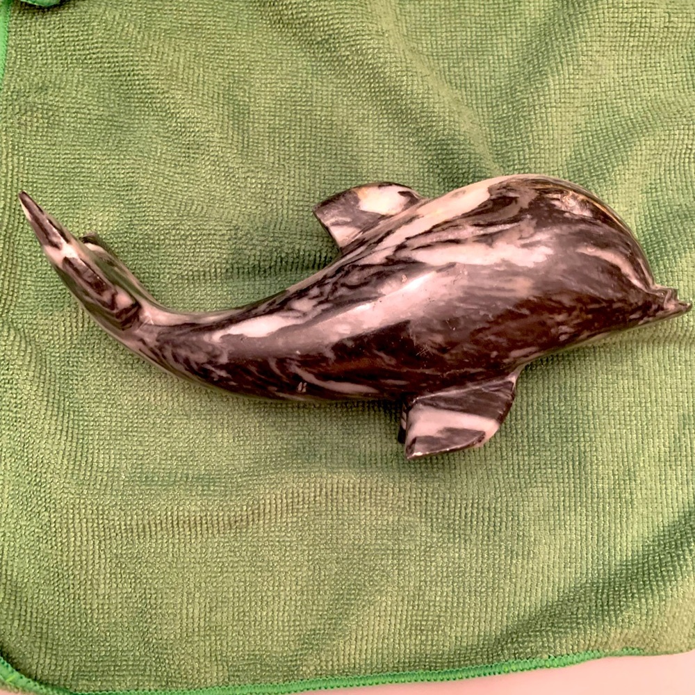 Marble dolphin statue